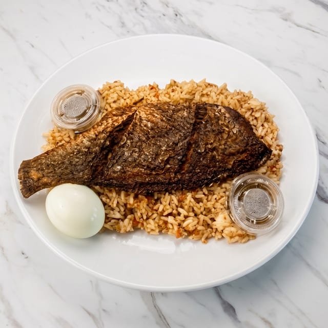 Fried Croaker with Corned Beef Rice.